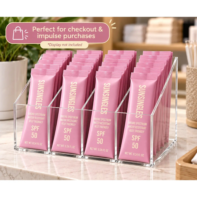 SunSingles pink SPF 50 sunscreen packets, reef friendly and water resistant